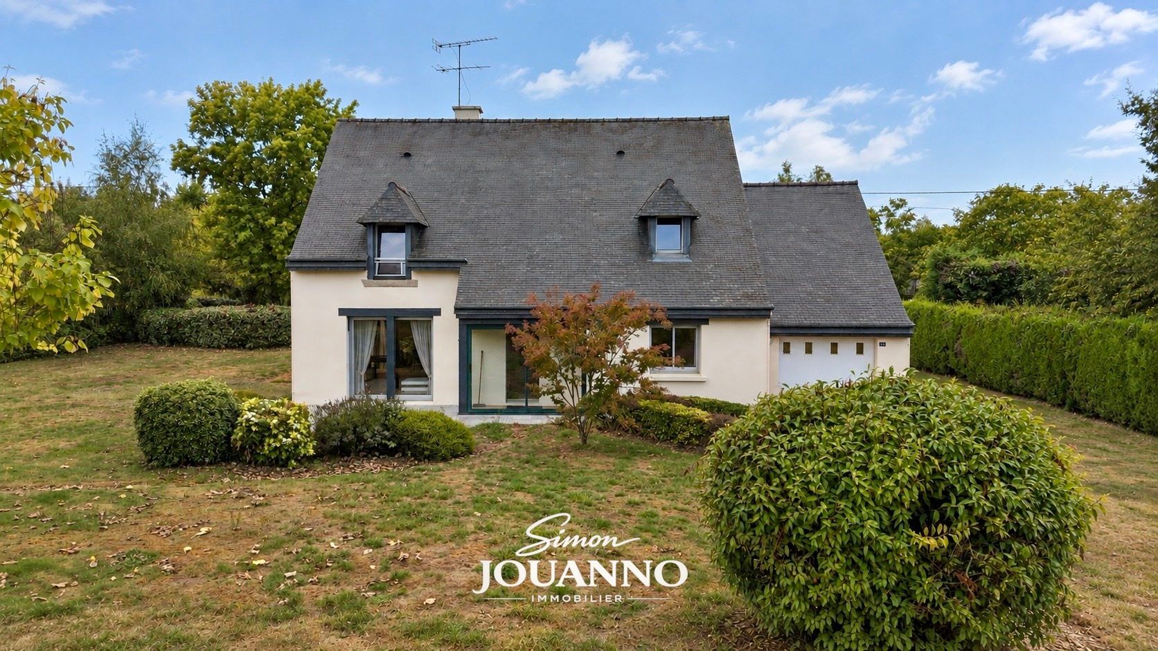Maison avec grand terrain au coeur de Bréhan