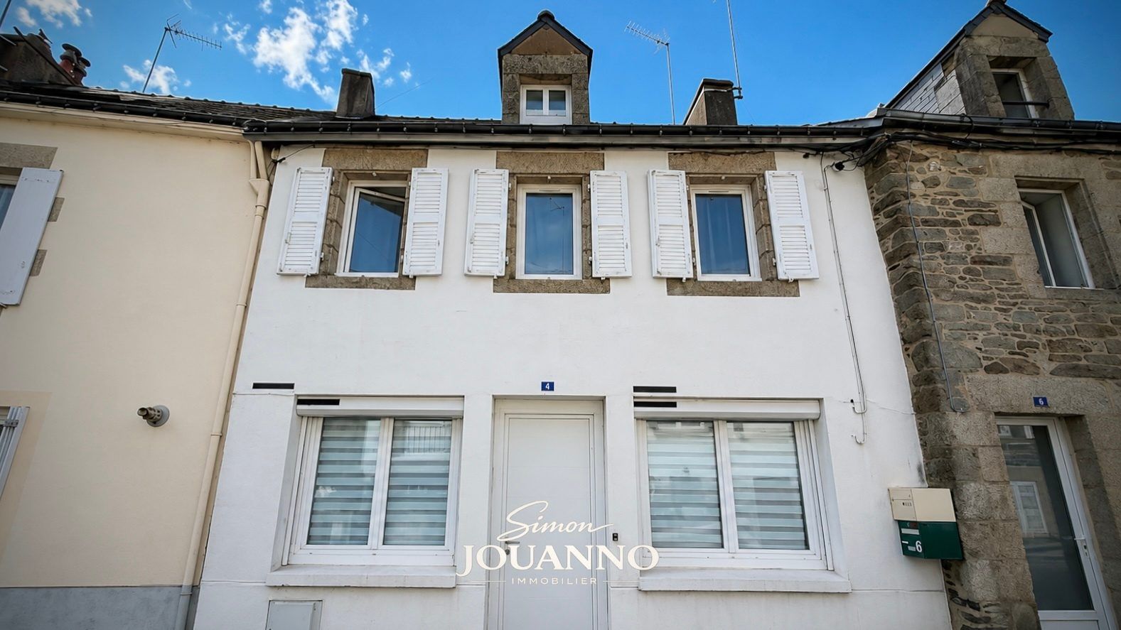 Maison rénovée avec revenu locatif  - Centre-ville face au Blavet